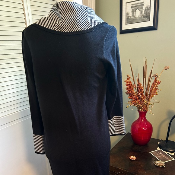 Beautiful cowl neck black sweater dress with black and white sleeves and collar. - Picture 3 of 6